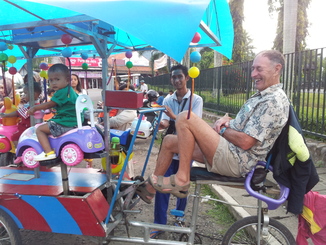 thumb_Pedalling_a_kiddy_merry-go-round.Java..jpg